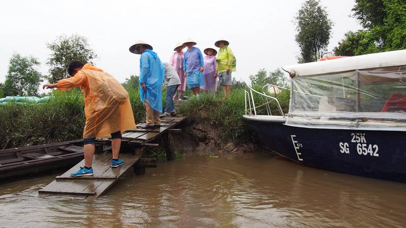 Delta do Mekong Ho Chi Minh City Vietnam - Pelos canais do Delta em barco típico usando Non Lá